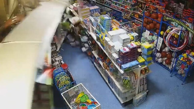 Police hunt for two suspects after toy store is target of early morning ram raid