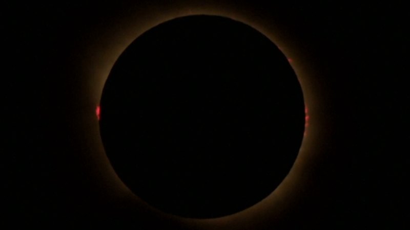 Solar eclipse visible across Europe as skies dim in rare celestial event