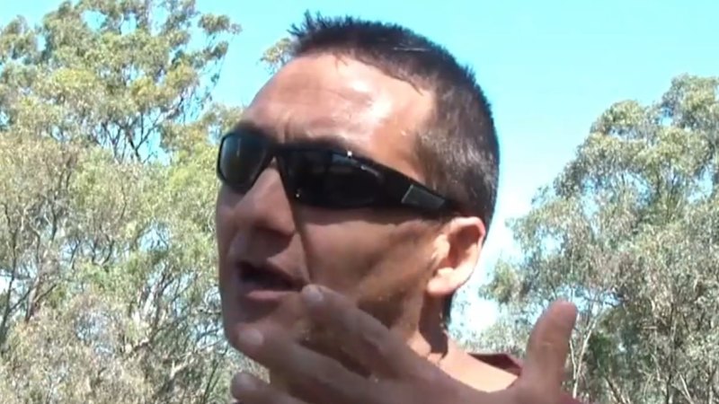 New search for accused police killer enters second day