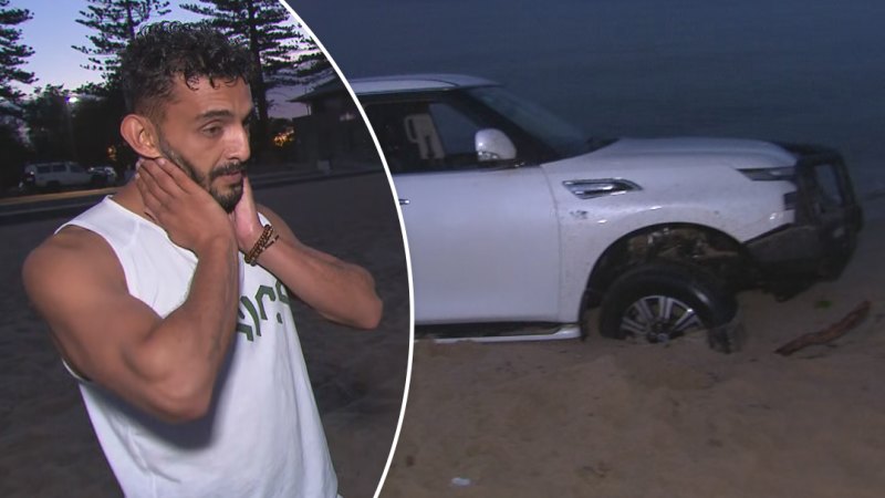 Car bogged on Elwood beach