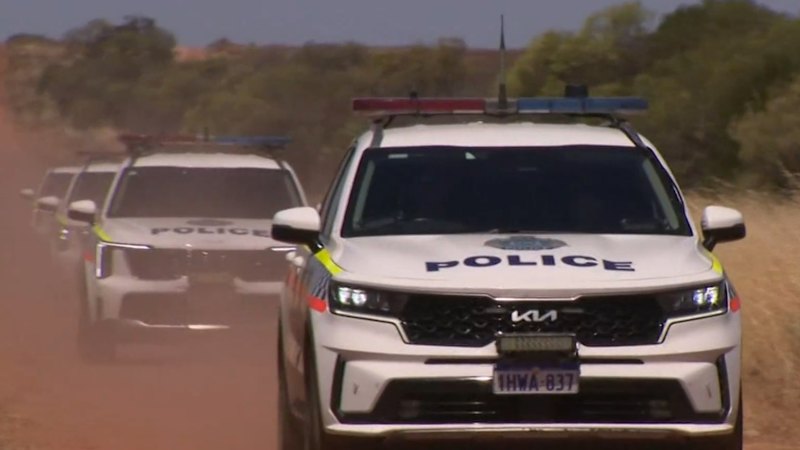 Partner of gunman on the run issues plea from hospital bed