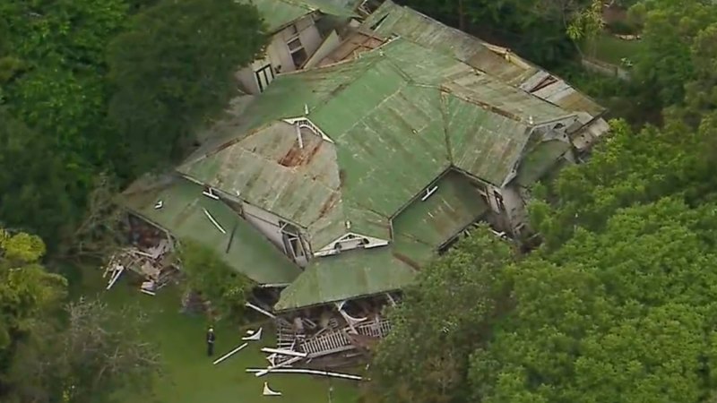 Queensland house collapses with woman, 85, inside