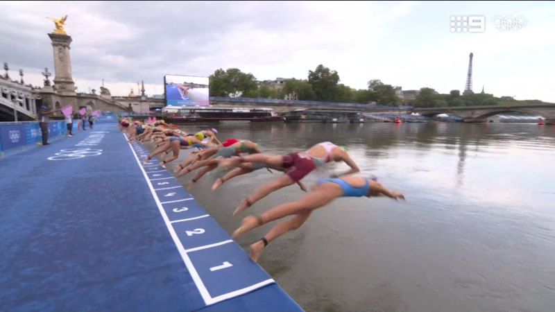 Athletes dive into River Seine