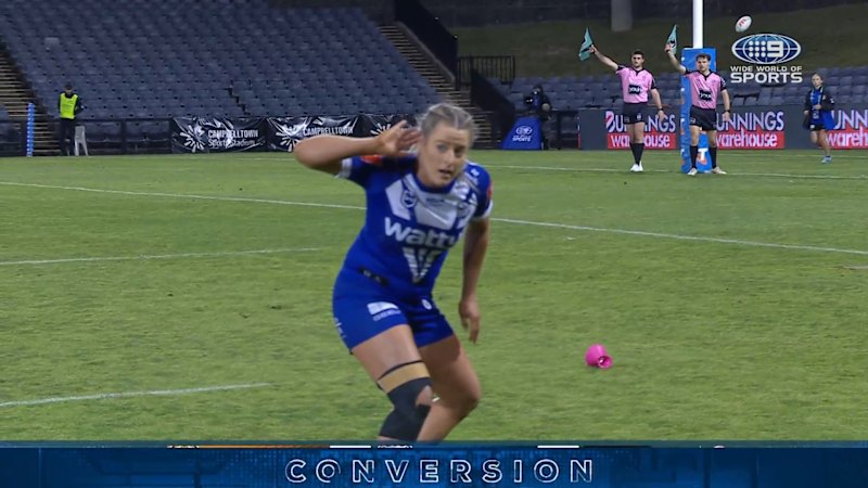 Tayla Preston cups ears after goal as fans taunt on field