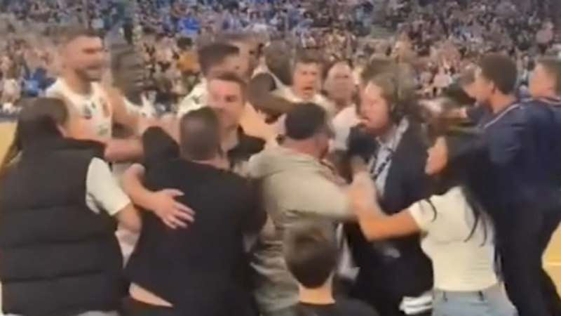 Fev seated courtside for wild NBL brawl