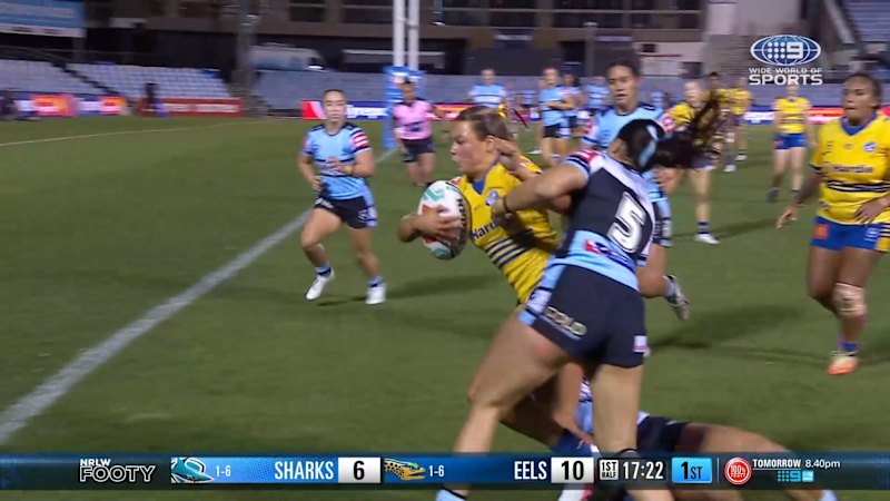 Rory Owen scores as he breaks through defenders for the Eels