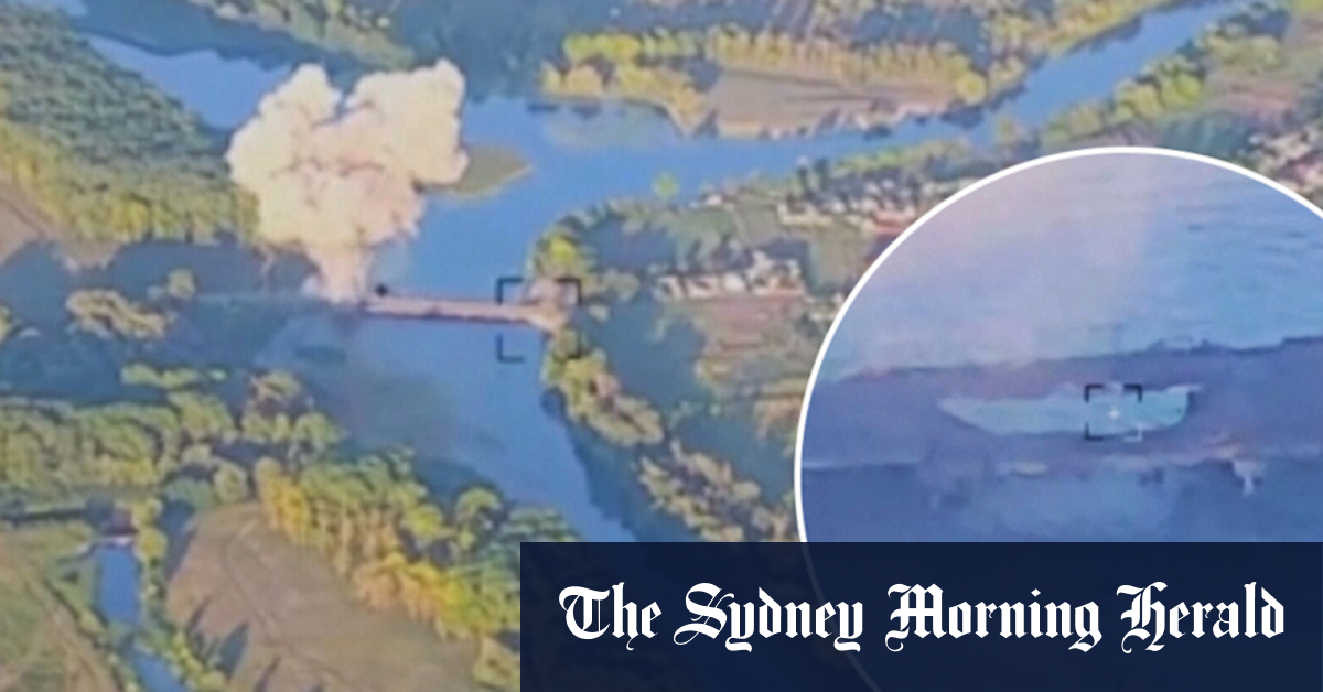 Ukrainian troops blow a hole in Russian bridge during Kursk incursion
