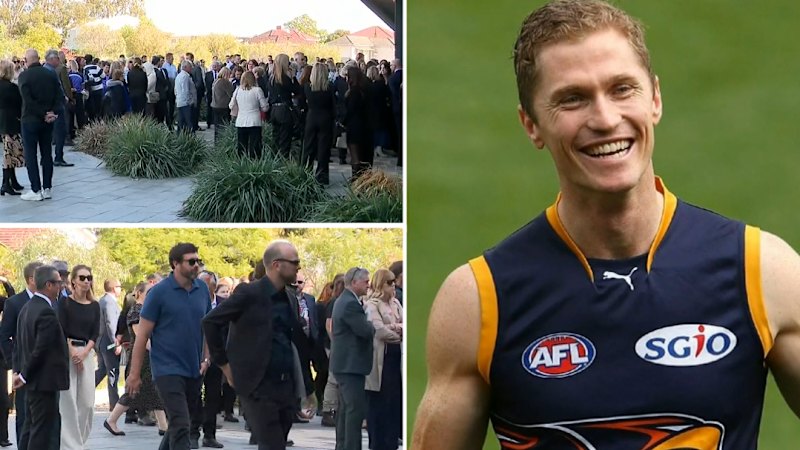AFL community gathers for funeral of Adam Selwood