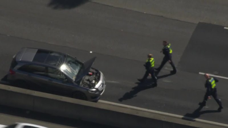 Driver on the run following peak hour crash on busy Melbourne freeway