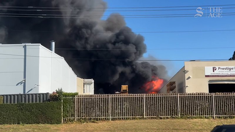 Firefighters are battling a factory fire in Sydney’s southwest