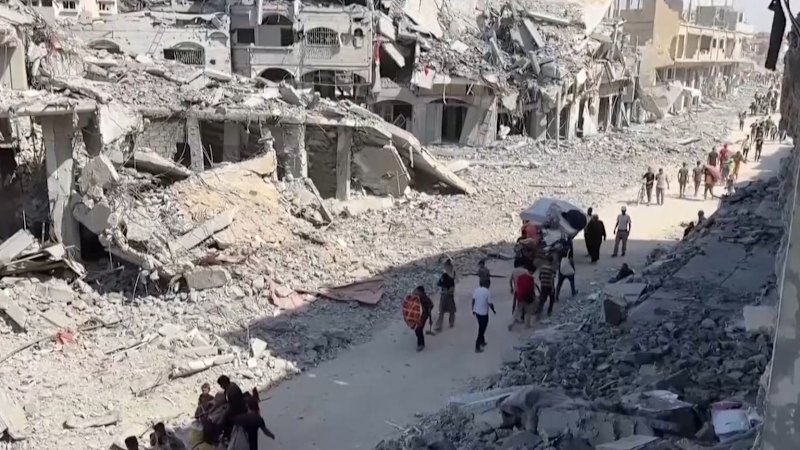 Thousands of Palestinians return to what remains of their homes as Gaza ceasefire begins