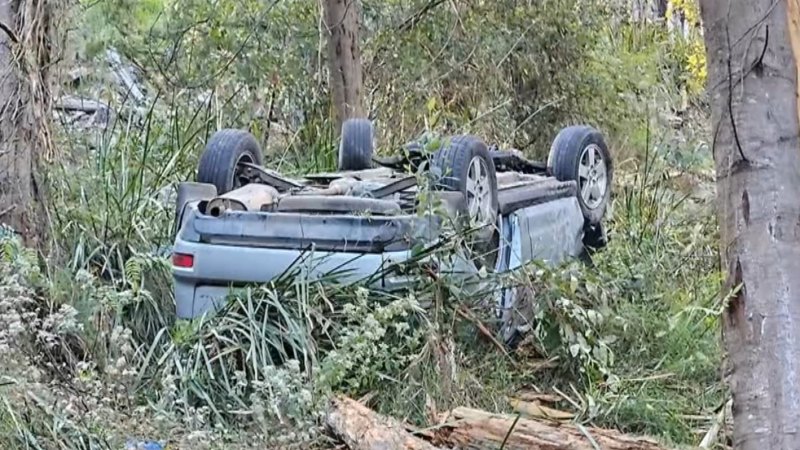 Man trapped overnight after car plunges off cliff in Melbourne’s outer east