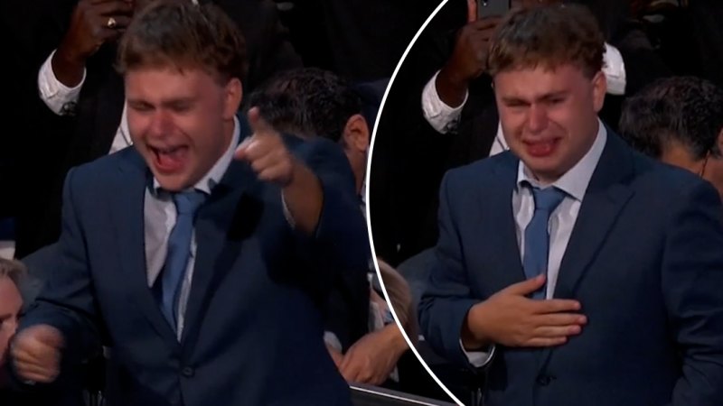 Sweet moment Tim Walz's son proudly but tearfully mouths 'that's my dad!'