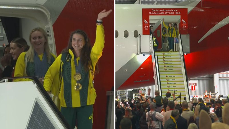 Aussie heroes land in Sydney