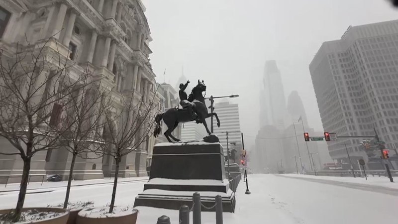 Heavy snow falls on Philadelphia as winter storm hits U.S.