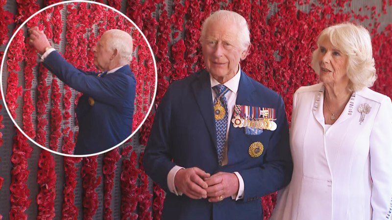 King Charles and Queen Camilla walk though poppy wall at the Australian wall memorial