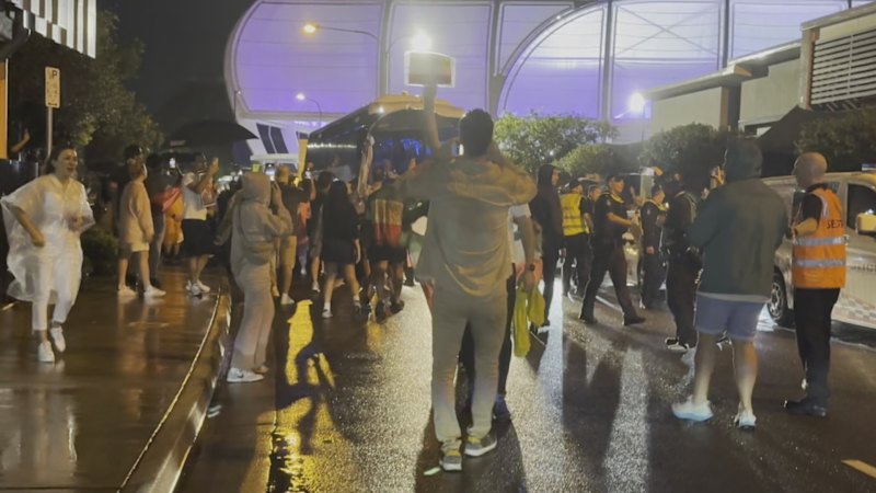 Protestors surround Iran team bus