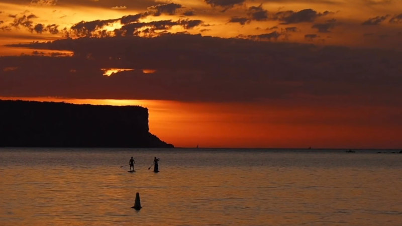 Sydney swelters in blast of summer heat