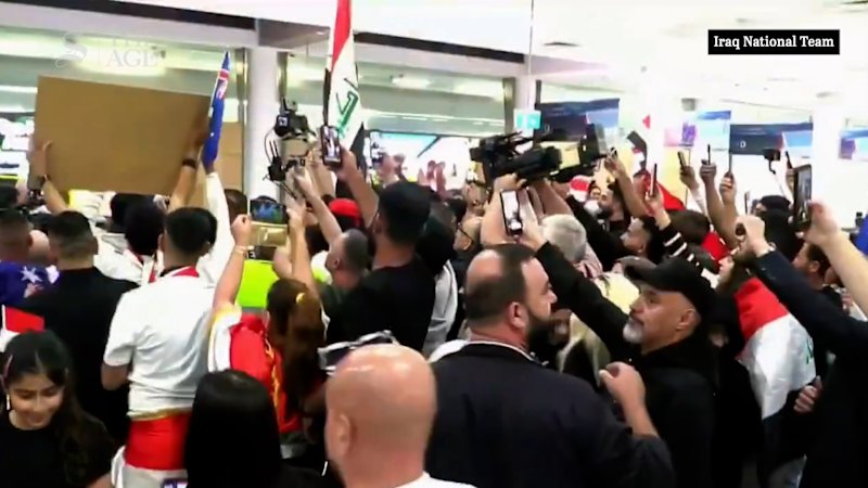 A hero’s welcome for Iraq football coach Graham Arnold at Sydney Airport