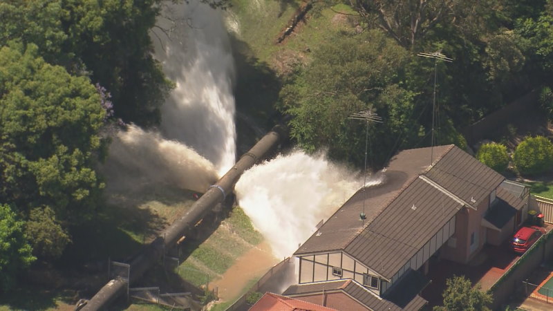 Burst water pipe sends water gushing into southern Sydney home