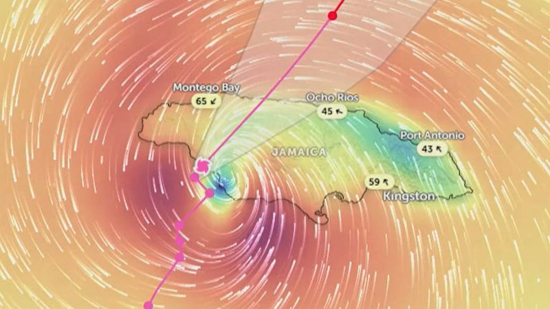 Jamaican police survey damage from Hurricane Melissa