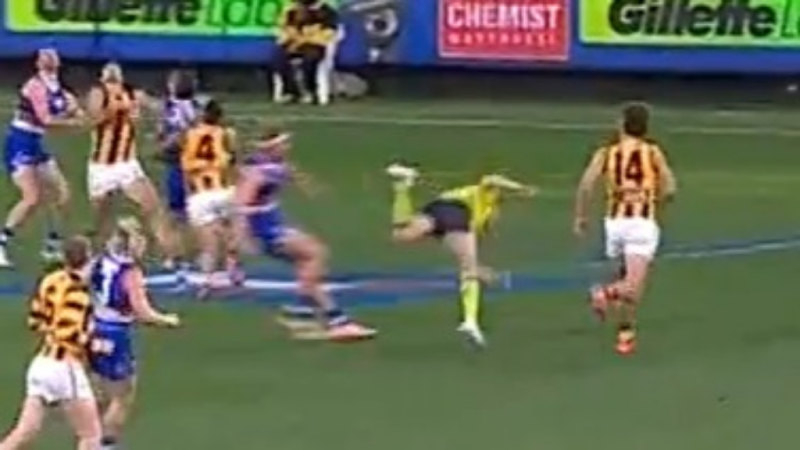 AFL umpire hurt in scary accident