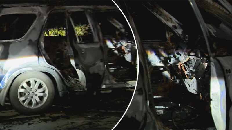 Two cars set alight and driven into Melbourne mansion overnight