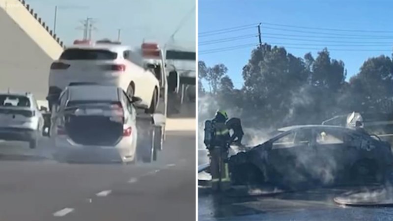 Car hanging from tow truck catches fire on Melbourne road