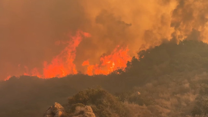 Residents flee LA wildfires