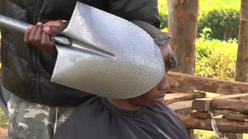 Kenyan barber who wields a sharpened shovel thrives on Africa's social media craze