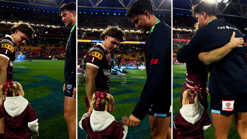 Origin rivals share heartfelt embrace