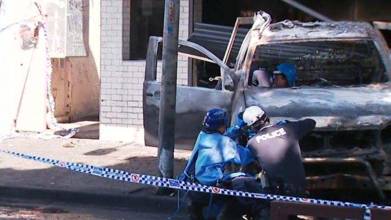 Ute slams into Brisbane shop, set alight