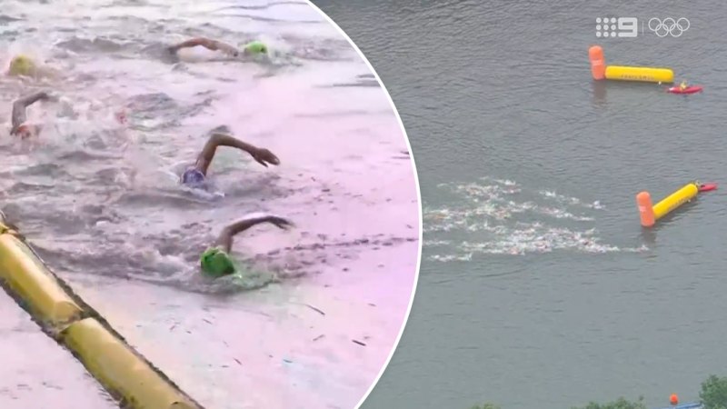 Triathletes fight against Seine’s mighty current