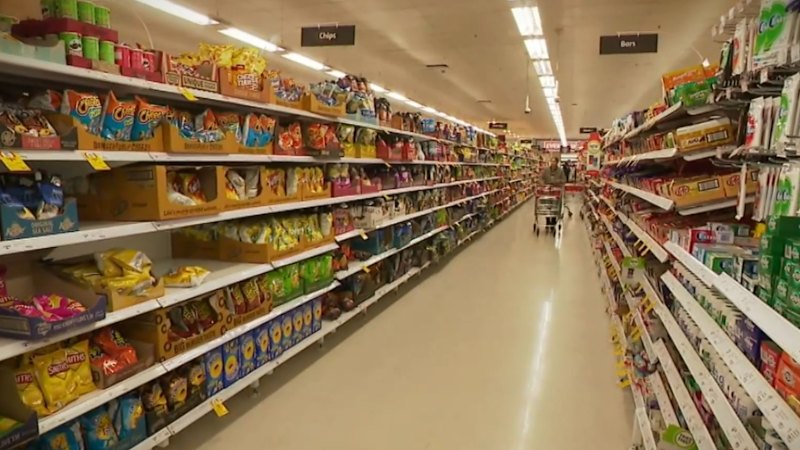 Woman in hospital after alleged attack inside Coles