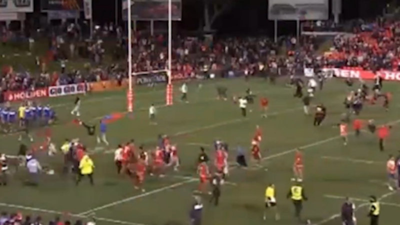 Tonga fans storm the field after their big win over Samoa in 2013