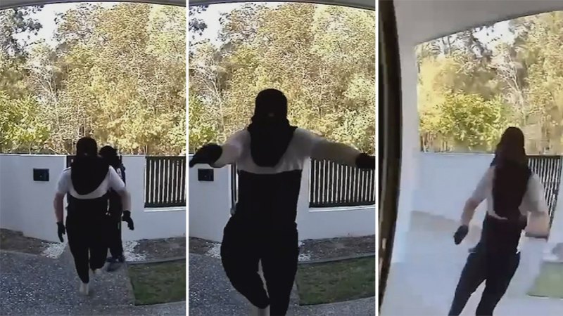 The moment intruders burst into Brisbane home