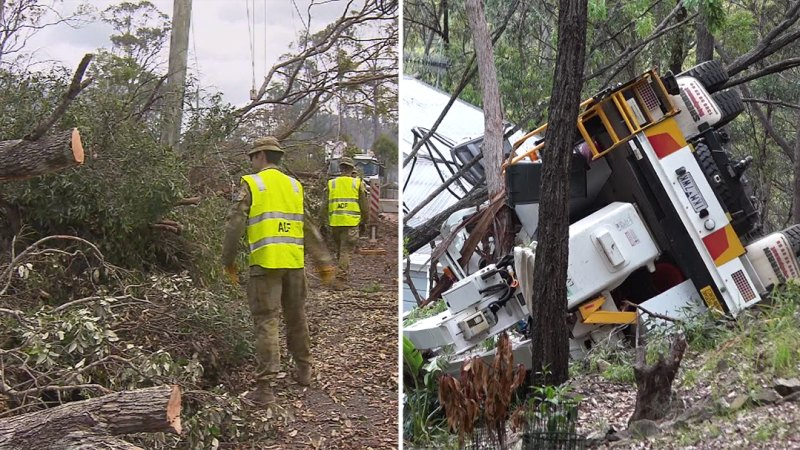 Cherry picker crashes during Queensland storm clean-up