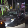 Luxury Lamborghini sports car hits power pole on the Gold Coast.