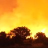 Fast-moving bushfire destroys at least 10 homes in Perth