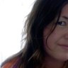Canberra author dies, partner missing  in beach tragedy