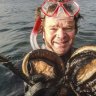 Shell be right: Rob Pennicott dives for abalone.