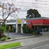 Gang armed with garden stakes storm Maccas, steal phones, cards, cash