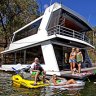 Have house, will travel: life on the lake floats this family's boat