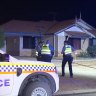 A man has been arrested after a woman was found dead in a house fire that police are treating as suspicious.