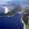 Aerial view showing the beach of Copacabana (L) and the Sugar Loaf hill in Rio de Janeiro, Brazil