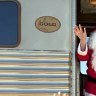 Cross our heart ... (from left) dining in the restaurant car; winding through the outback; Santa's a hit with children in Watson.