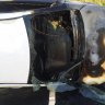 Police pull man from burning car at Gympie