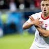 Switzerland strike late to sink Serbia