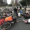 Cyclists stage 'die-in' during Brisbane peak hour
