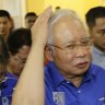 Malaysia's Najib concedes but uncertainty looms